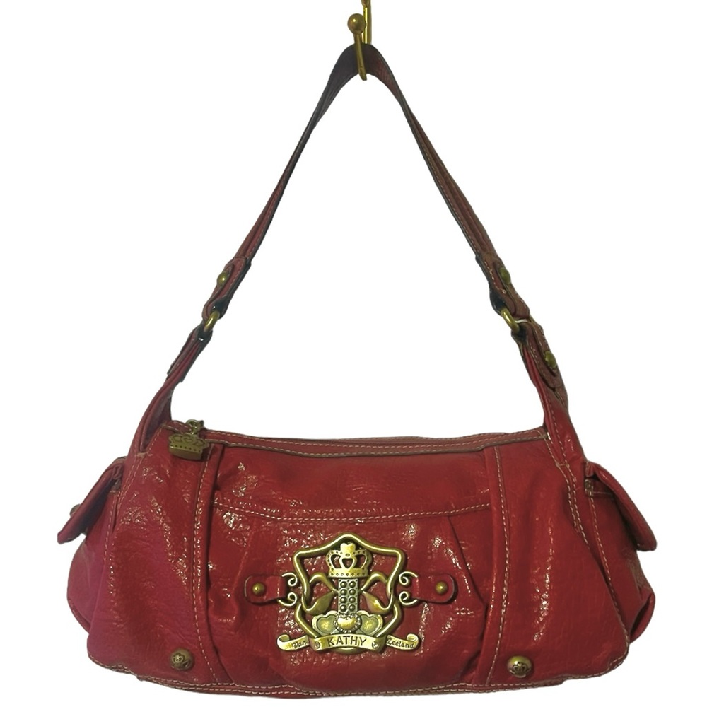 KATHY VAN ZEELAND RED SHOULDER BAG.